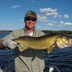 Man posing with a fish