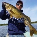 Man posing with a fish