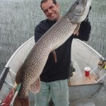 Man holding a pike