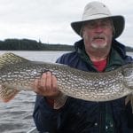 Man holding a pike