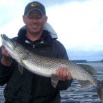 Man holding a pike