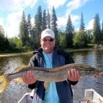 Man holding a pike