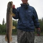 Man holding a pike