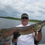 Man holding a pike