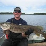 Man holding a pike