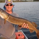 Man holding a pike