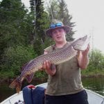 Man holding a pike