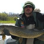 Man holding a pike