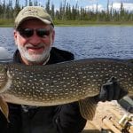 Man holding a pike