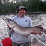 Man holding a pike