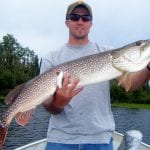 Man holding a pike