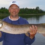 Man holding a pike
