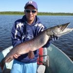 Man holding a pike