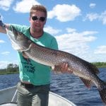 man holding a pike