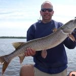 Man holding a pike