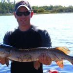 Man holding a pike