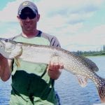 Man holding a pike