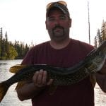 Man holding a pike