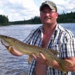 Man holding a pike
