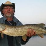Man holding a pike
