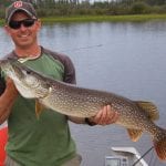 Man holding a pike