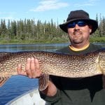 Man holding a pike