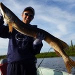 Man holding a pike