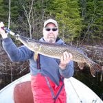Man holding a pike