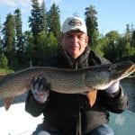man holding a pike