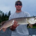 Man holding a pike