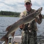 Man holding a pike
