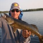 Man Posing with a Walleye