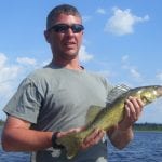 Man Posing with a Walleye
