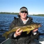 Man Posing with a Walleye
